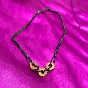 Marc Jacobs gunmetal and gold plated screw necklace.